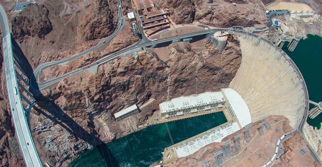 Capture aerial views of the historic Hoover Dam from inside your Maverick Helicopter