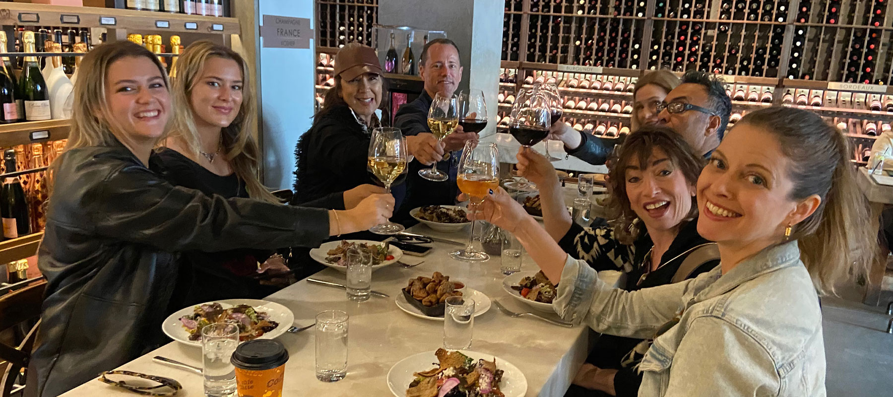 Guests raising a toast over lunch during a private Beverly Hills food experience