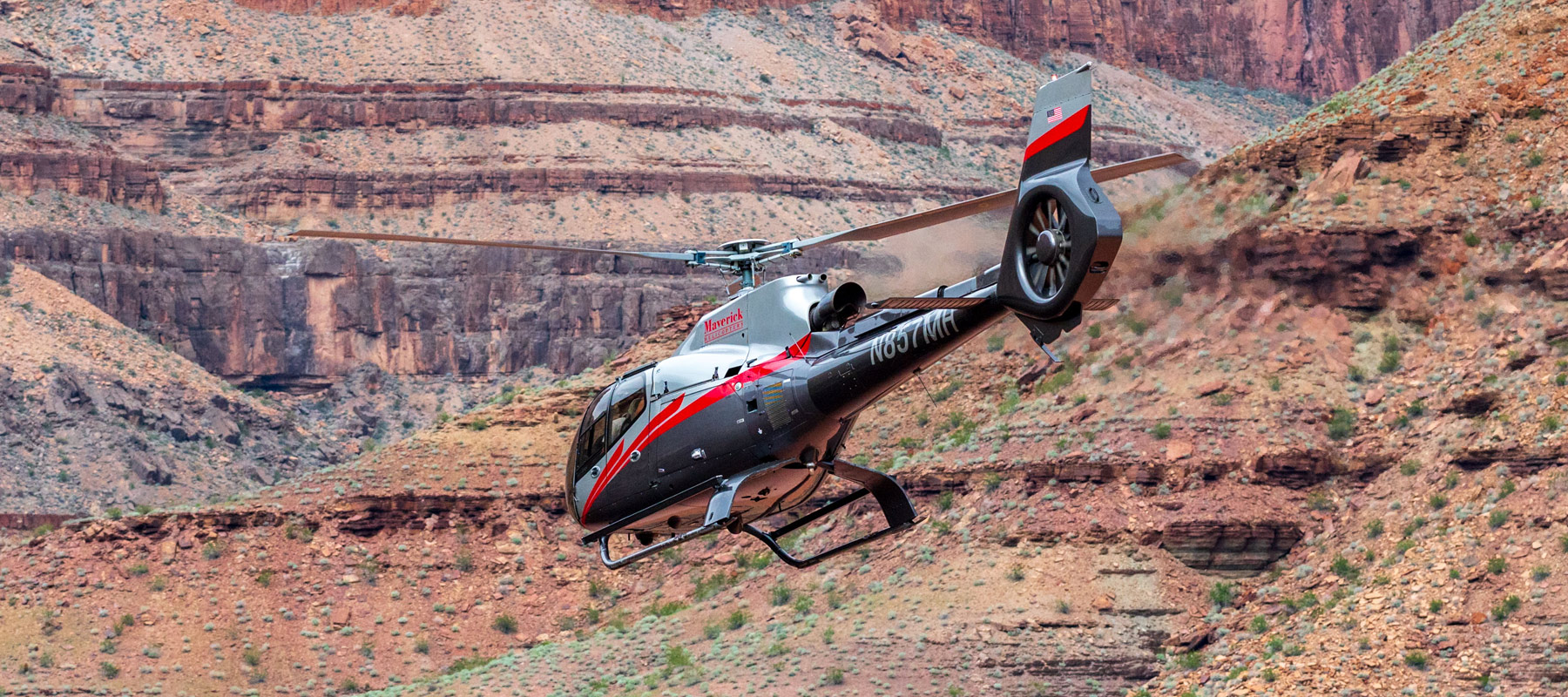 Soaring through the colorful canyon landscape of Grand Canyon West on our Wind Dancer tour