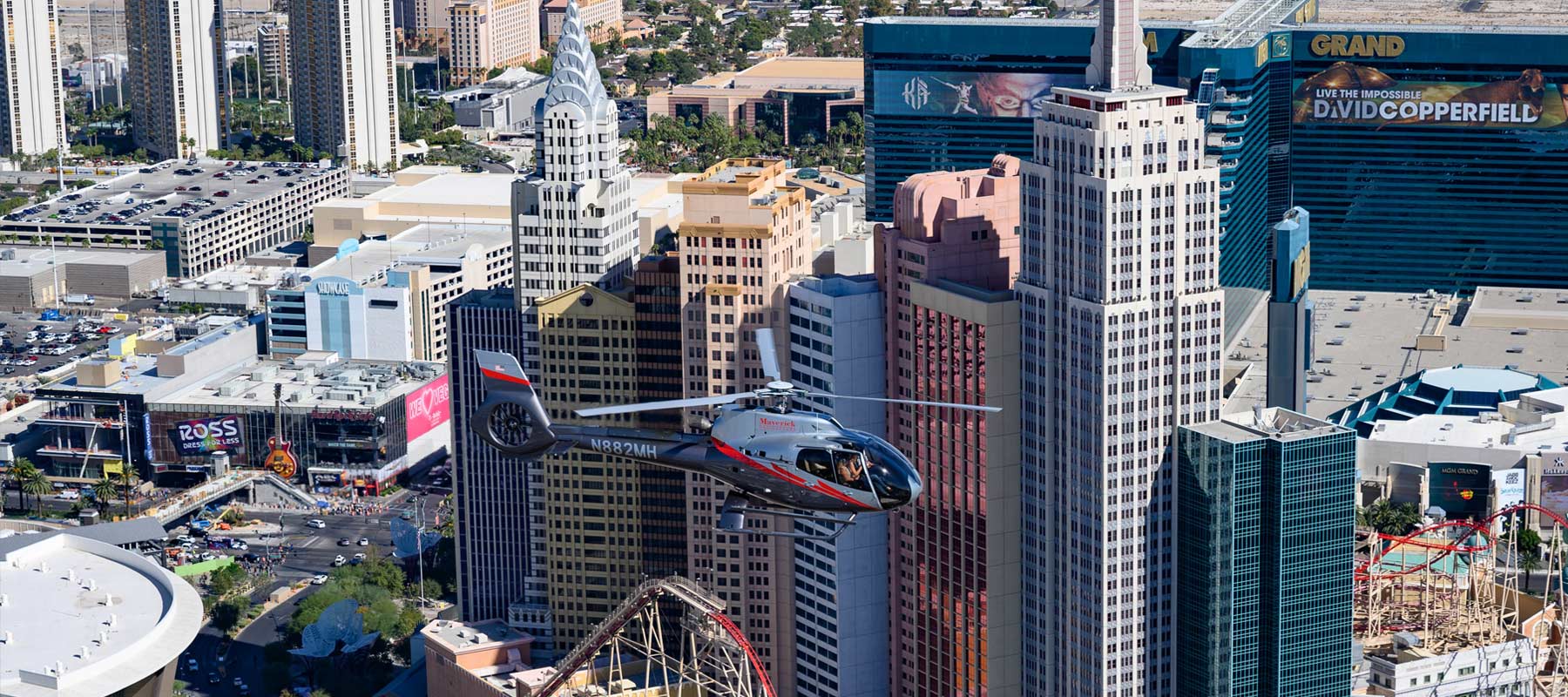 Vibrant Las Vegas Strip scene under the daylight sun.